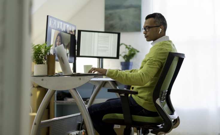 Man sitting at a desk working