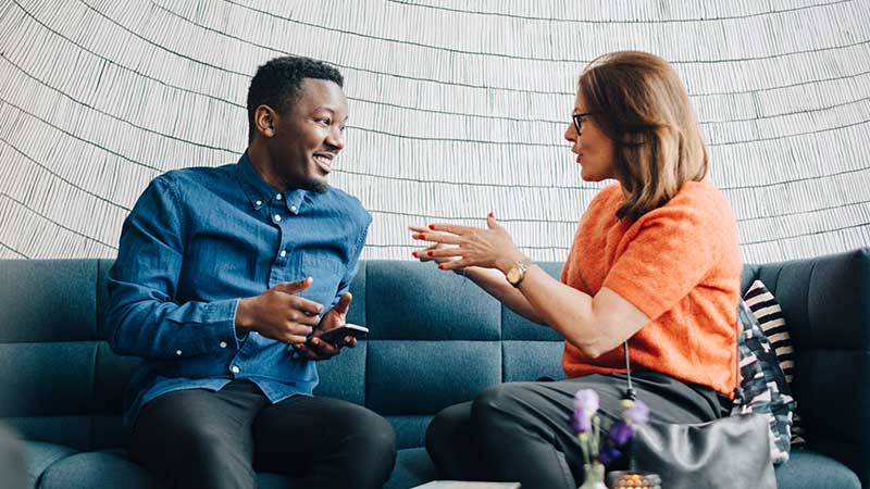 Man and woman in conversation