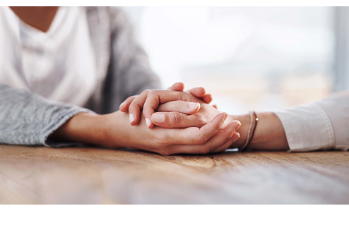 A couple holding hands