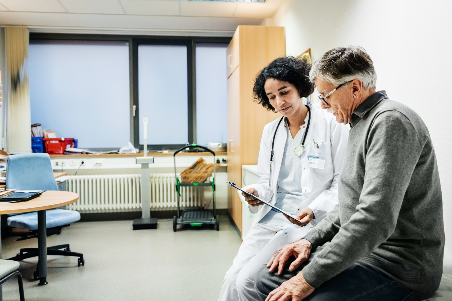 Doctor talking to patient